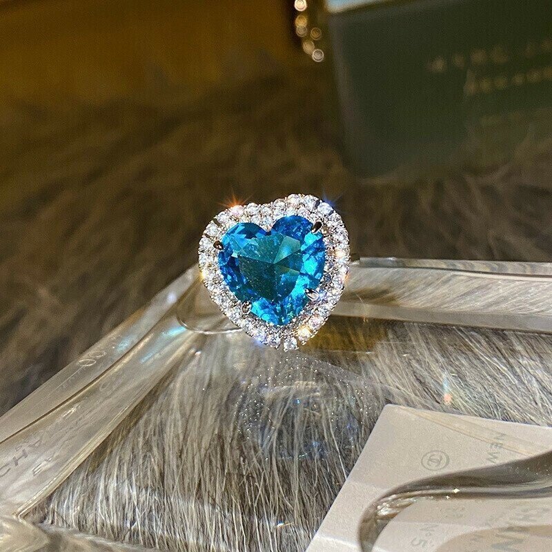 Electro-optical blue diamond butterfly ring