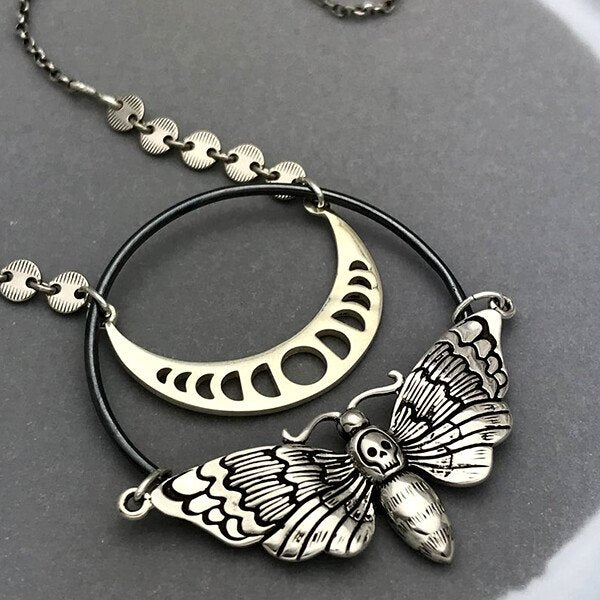 Moon Phase Skull Moth Necklace.