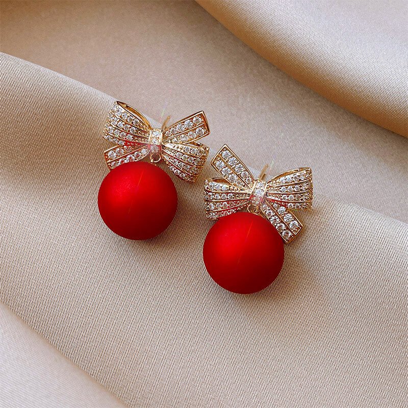 Bow red pearl earrings