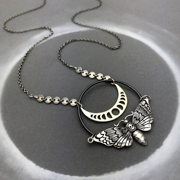 Moon Phase Skull Moth Necklace.