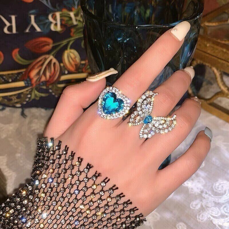 Electro-optical blue diamond butterfly ring